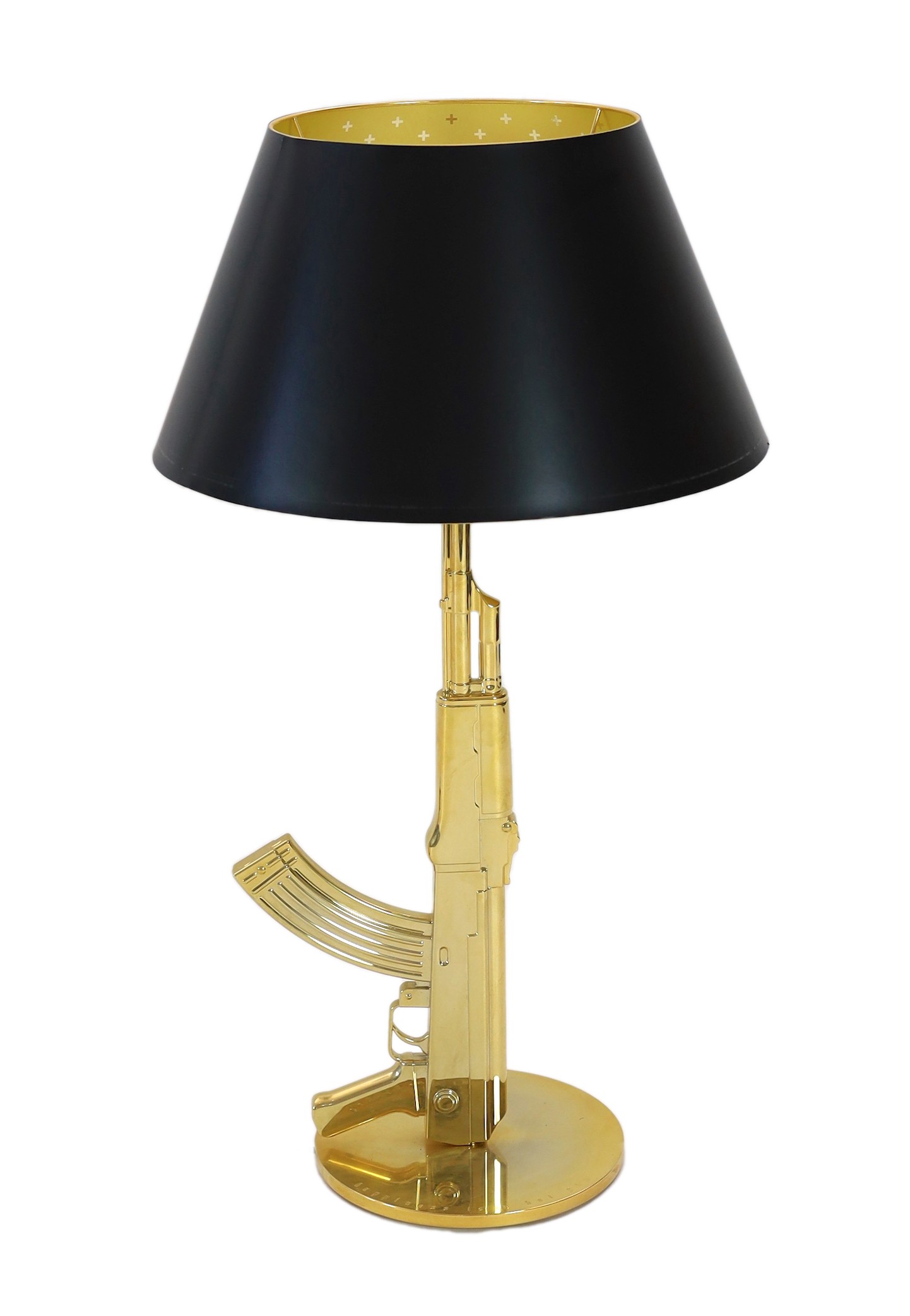 A Philippe Starck gilt metal kalashnikov table lamp, height overall 93cm